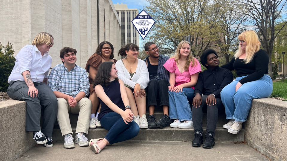 NRHH students posing for group photo with NRHH diamond logo.